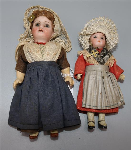 2 small bisque head dolls